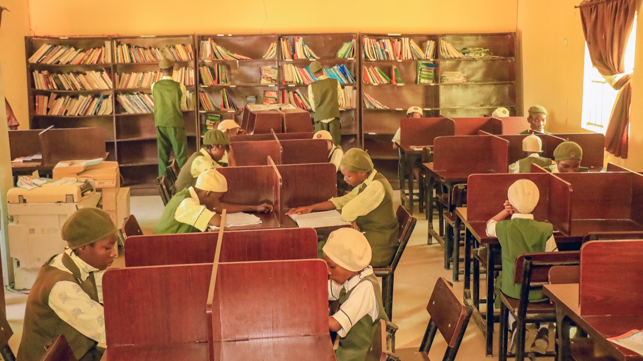 Secondary students in science laboratory at Integrity Academy